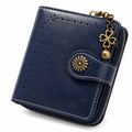Portefeuille bleu pour femme avec détails en métal